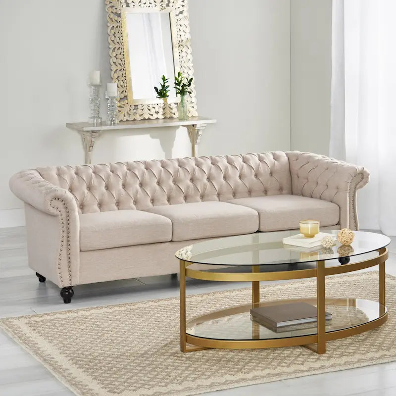 Canapé 3 places Chesterfield, capitonné, accoudoirs arrondis, garniture cloutée, dossier bas, beige, 3 personnes