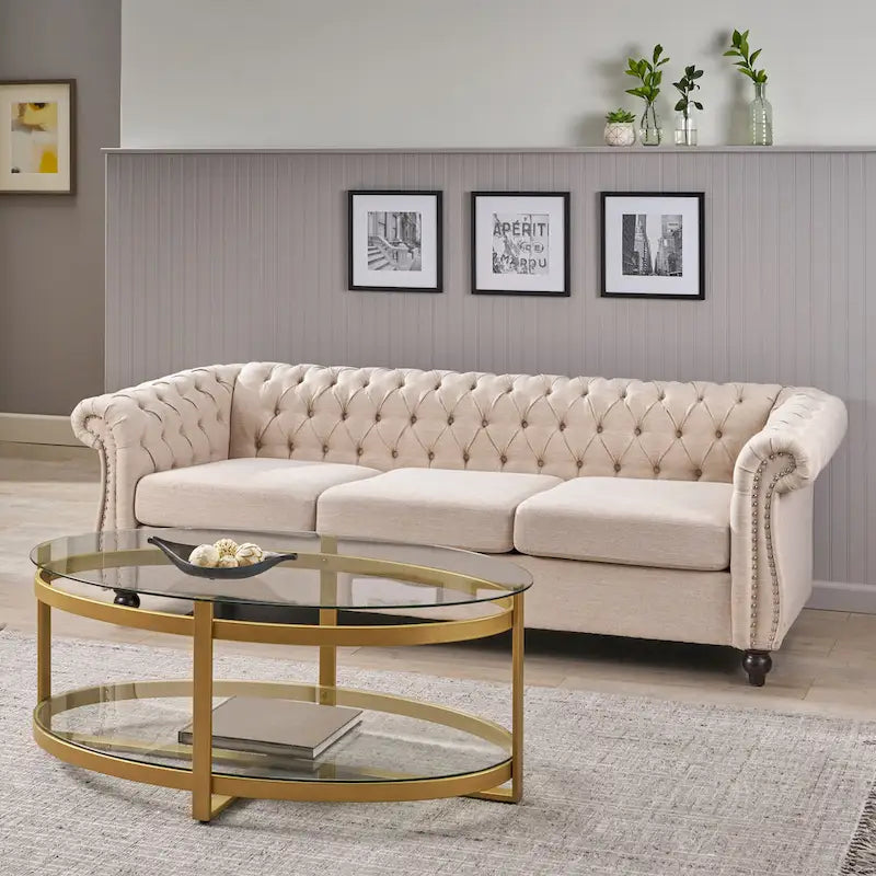 Canapé 3 places Chesterfield, capitonné, accoudoirs arrondis, garniture cloutée, dossier bas, beige, 3 personnes