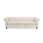 Canapé 3 places Chesterfield, capitonné, accoudoirs arrondis, garniture cloutée, dossier bas, beige, 3 personnes