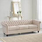 Canapé 3 places Chesterfield, capitonné, accoudoirs arrondis, garniture cloutée, dossier bas, beige, 3 personnes