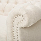 Canapé 3 places Chesterfield, capitonné, accoudoirs arrondis, garniture cloutée, dossier bas, beige, 3 personnes